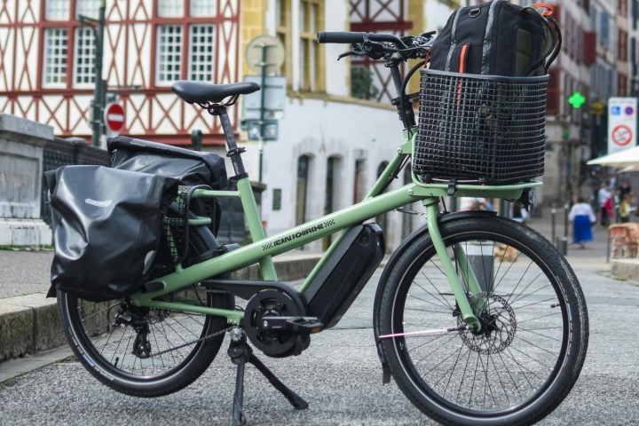 a bicycle parked on the side of a building
